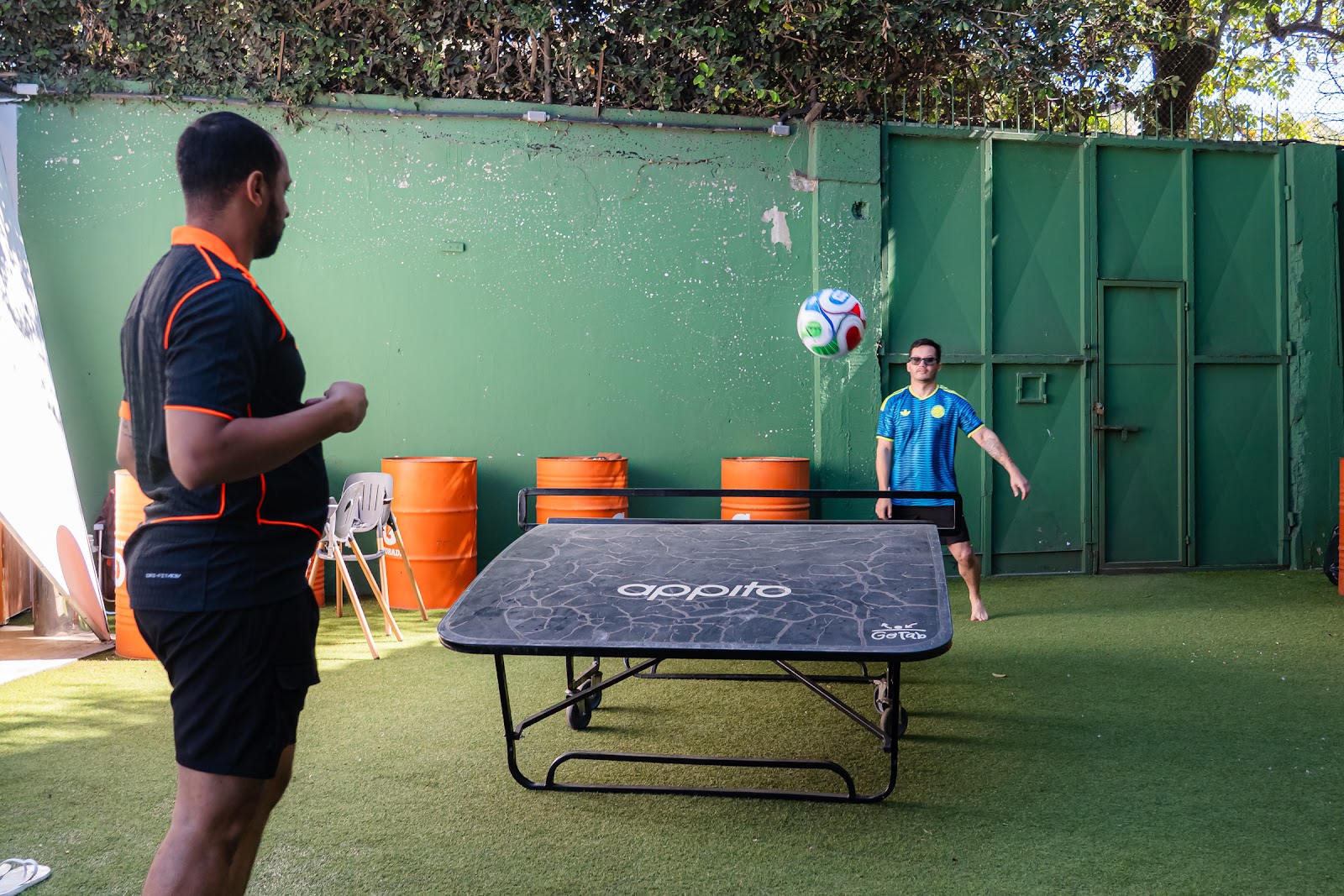 Two participants playing teqball at Appito Arena